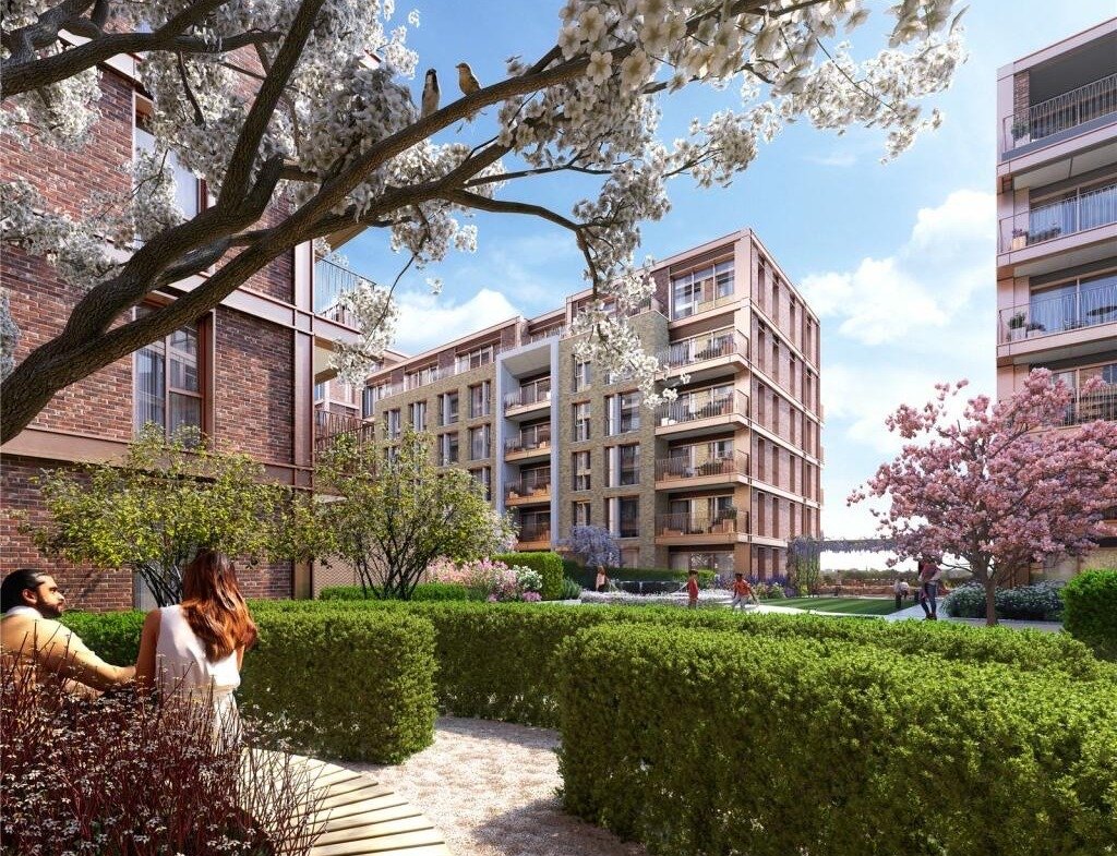 Landscaped garden courtyard at Kings Road Park London with modern residential buildings and greenery