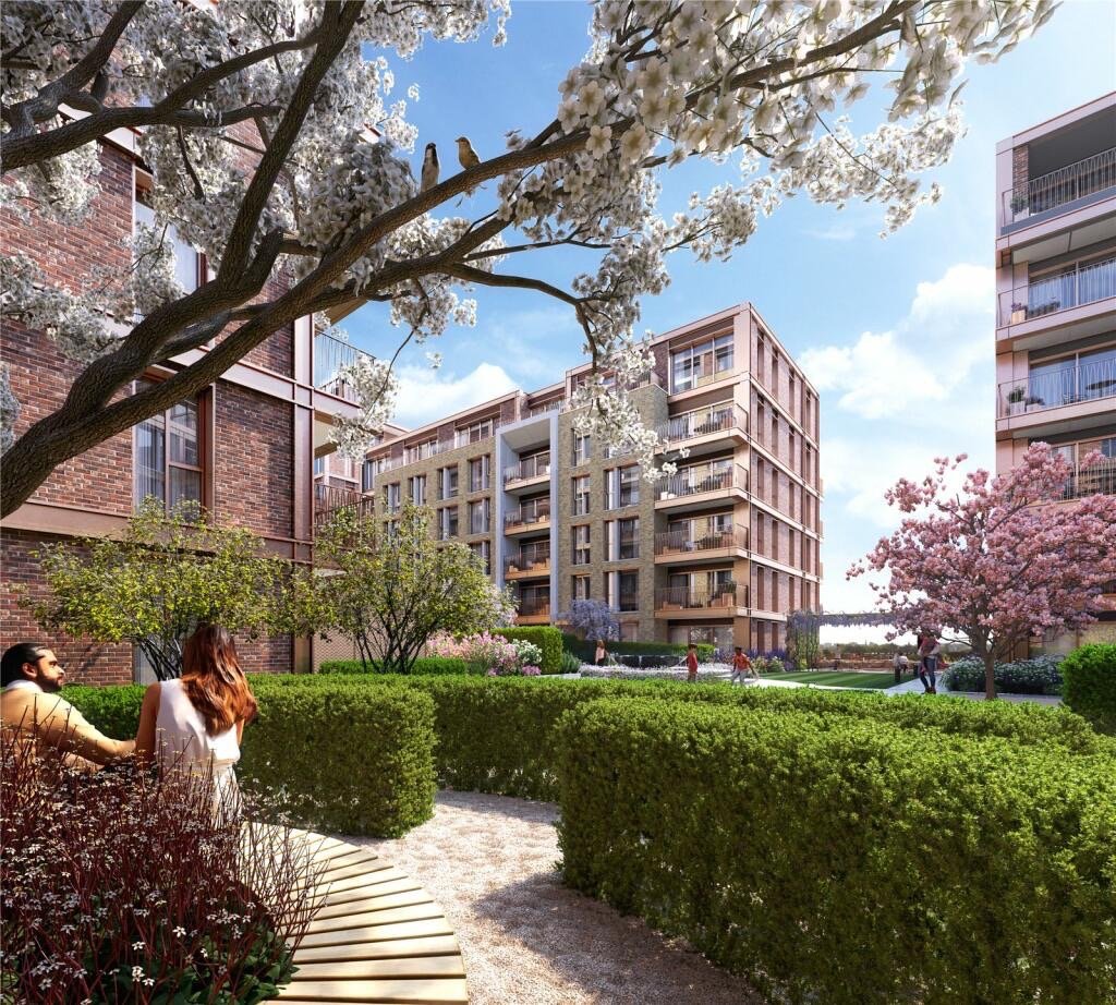 Landscaped garden courtyard at Kings Road Park London with modern residential buildings and greenery