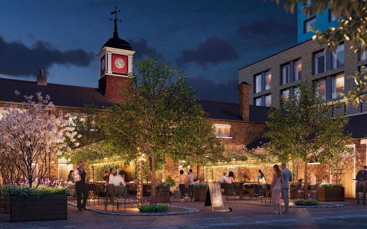 Evening courtyard terrace with outdoor dining, lighting and landscaped surroundings - 3 bedroom