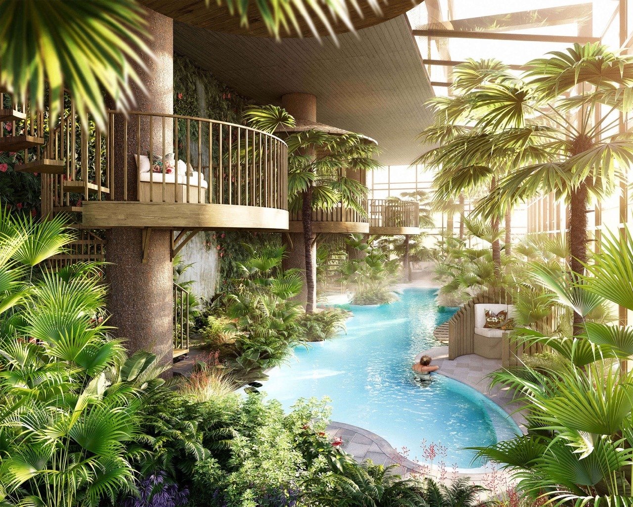 Tropical indoor lagoon pool surrounded by lush greenery and relaxation areas - 3 bedroom