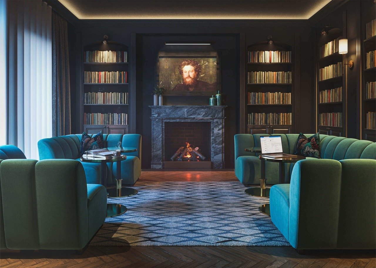 Elegant library lounge with fireplace, bookshelves and comfortable seating - 3 bedroom