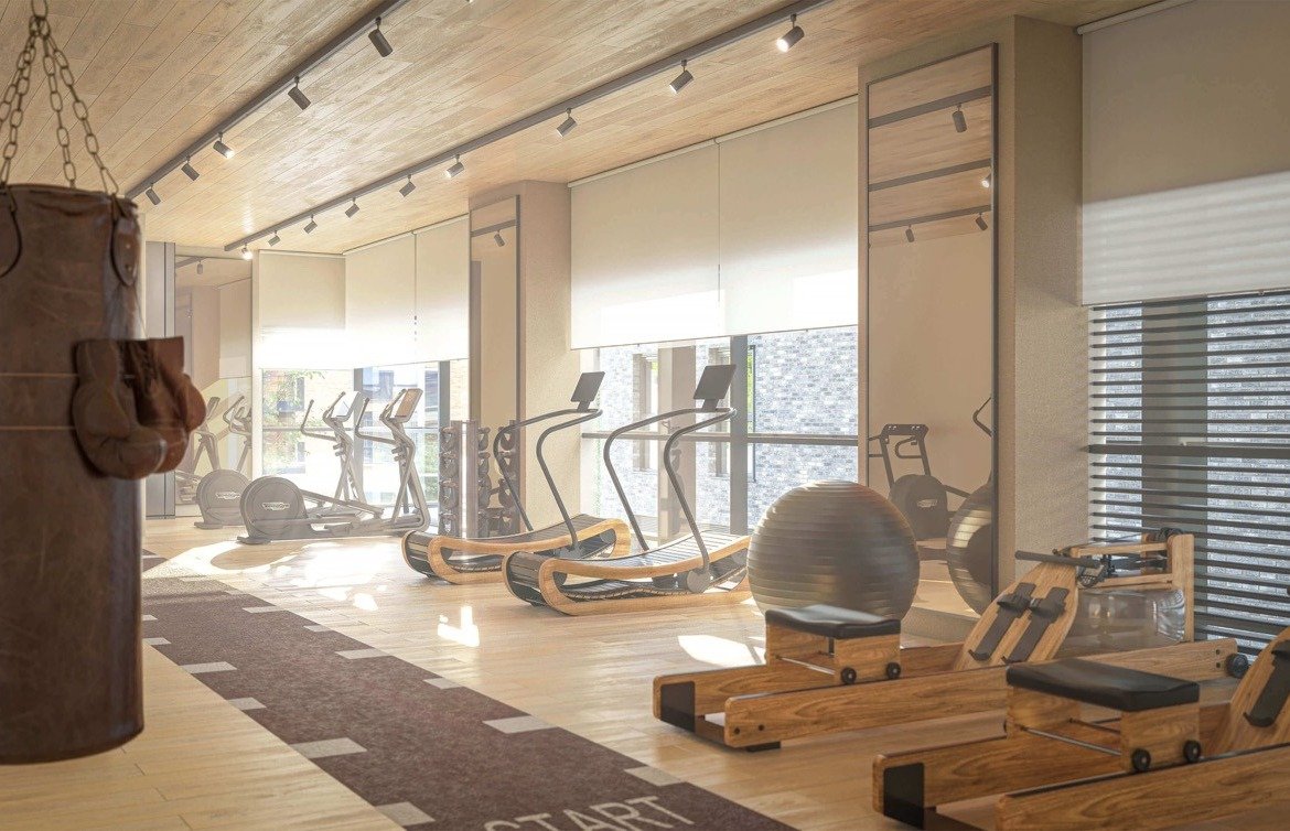Fully equipped residents gym with modern fitness equipment and natural lighting - 3 bedroom
