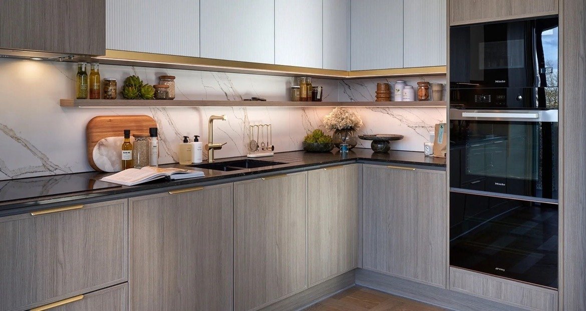Modern show home kitchen with integrated appliances and stylish finishes - 3 bedroom