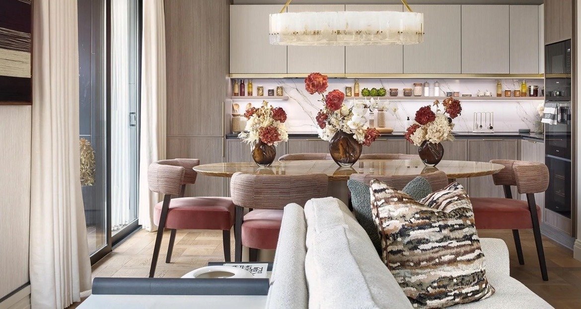 Open-plan kitchen and dining area with modern finishes and natural light - 3 bedroom