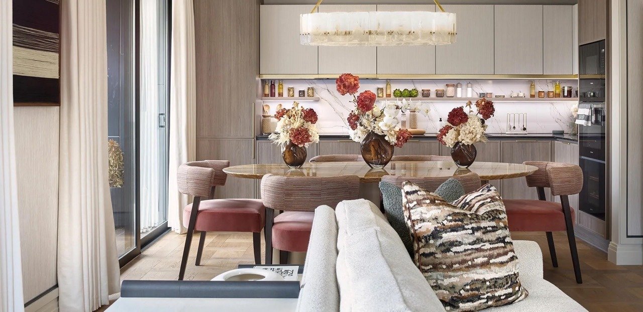 Open-plan kitchen and dining area with modern finishes and natural light - 3 bedroom