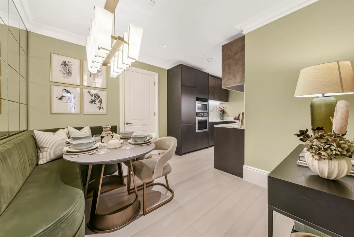 Allen House Kensington W8 Luxury Apartment Kitchen Dining Area Marble Backsplash Dark Cabinetry