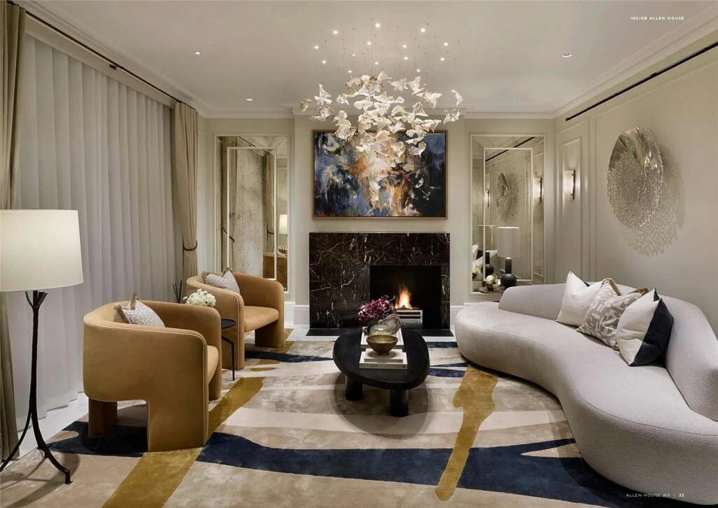 Allen House Kensington W8 Prestige Reception Room Marble Fireplace Sculptural Chandelier Curved Sofa