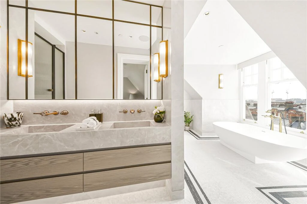 Allen House Penthouse Kensington W8 Principal Bathroom Freestanding Bath Skyline View Brass Sconces Mosaic Floor