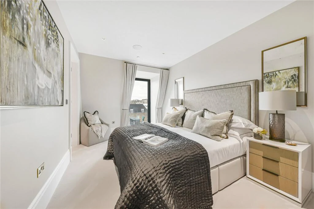 Allen House Penthouse Kensington W8 Second Bedroom Upholstered Headboard Gold Trim Chest Kensington Views