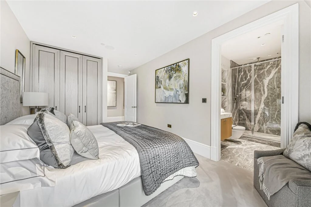 Allen House Penthouse Kensington W8 Third Bedroom Grey Fitted Wardrobes En Suite Marble Shower Glimpse