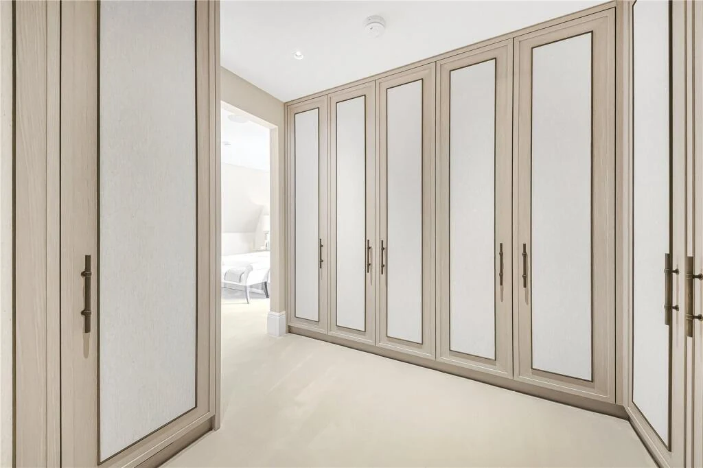 Allen House Penthouse Kensington W8 Walk In Dressing Room Bespoke Fitted Wardrobes Limed Oak Brass Handles