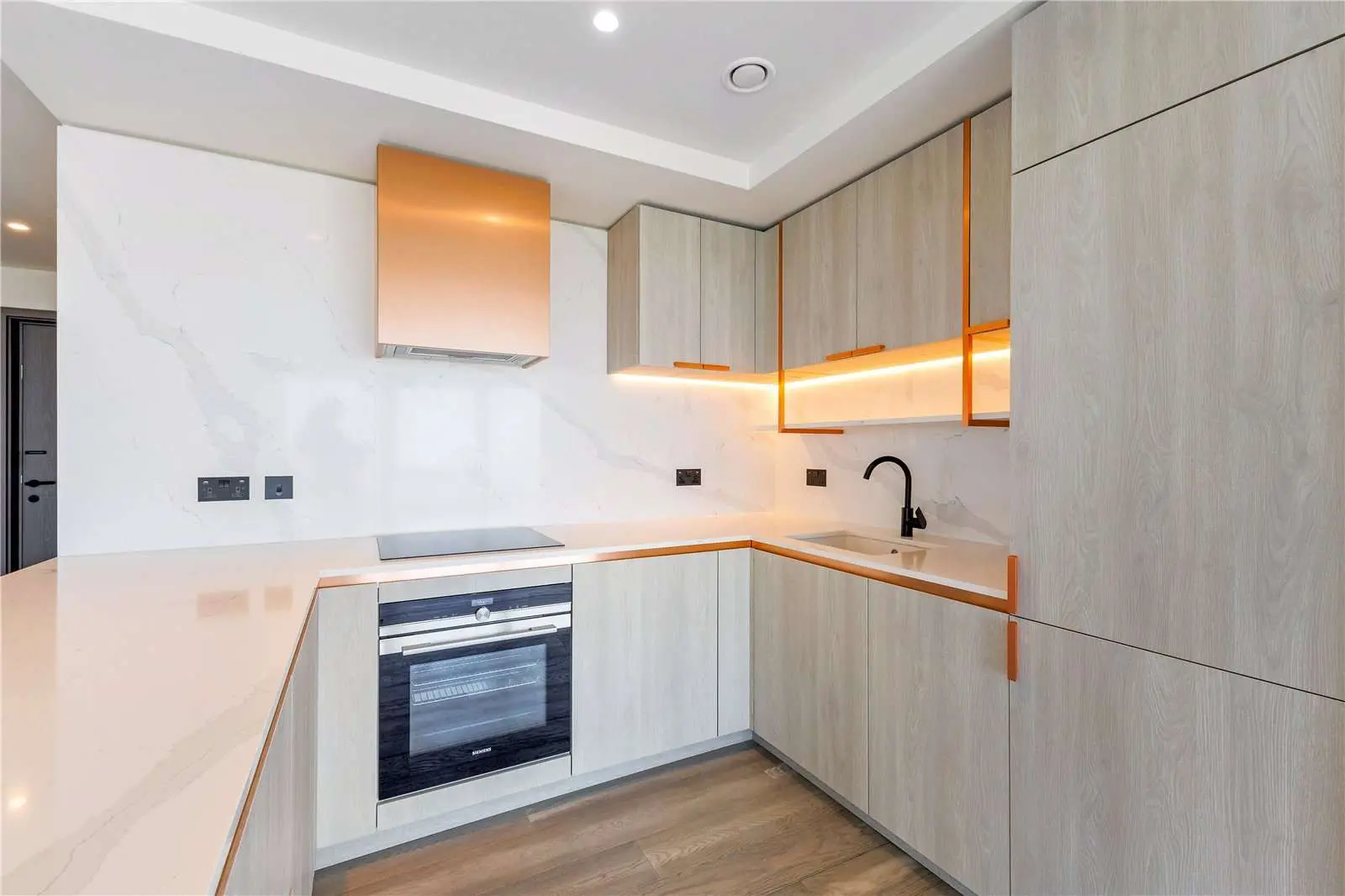 Aspen Consort Place Canary Wharf London E14 Luxury Kitchen Siemens Marble Copper Accents