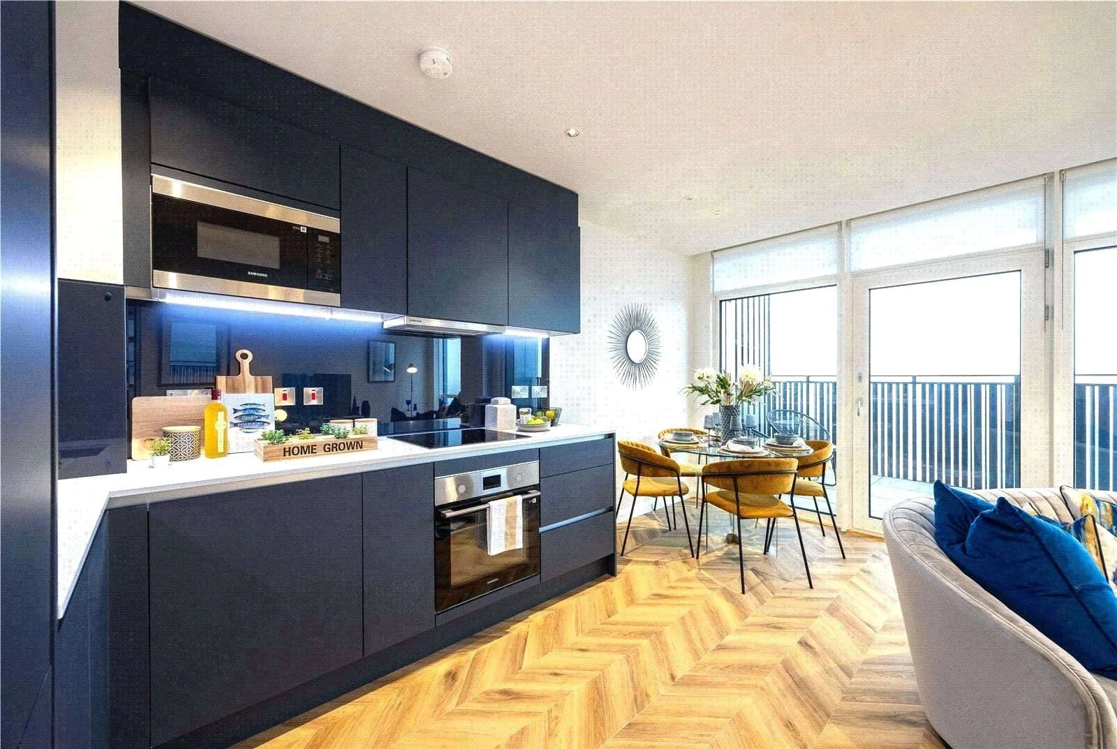 Cerulean Quarter Canning Town E16 Fitted Kitchen Navy Cabinets Integrated Appliances Balcony London