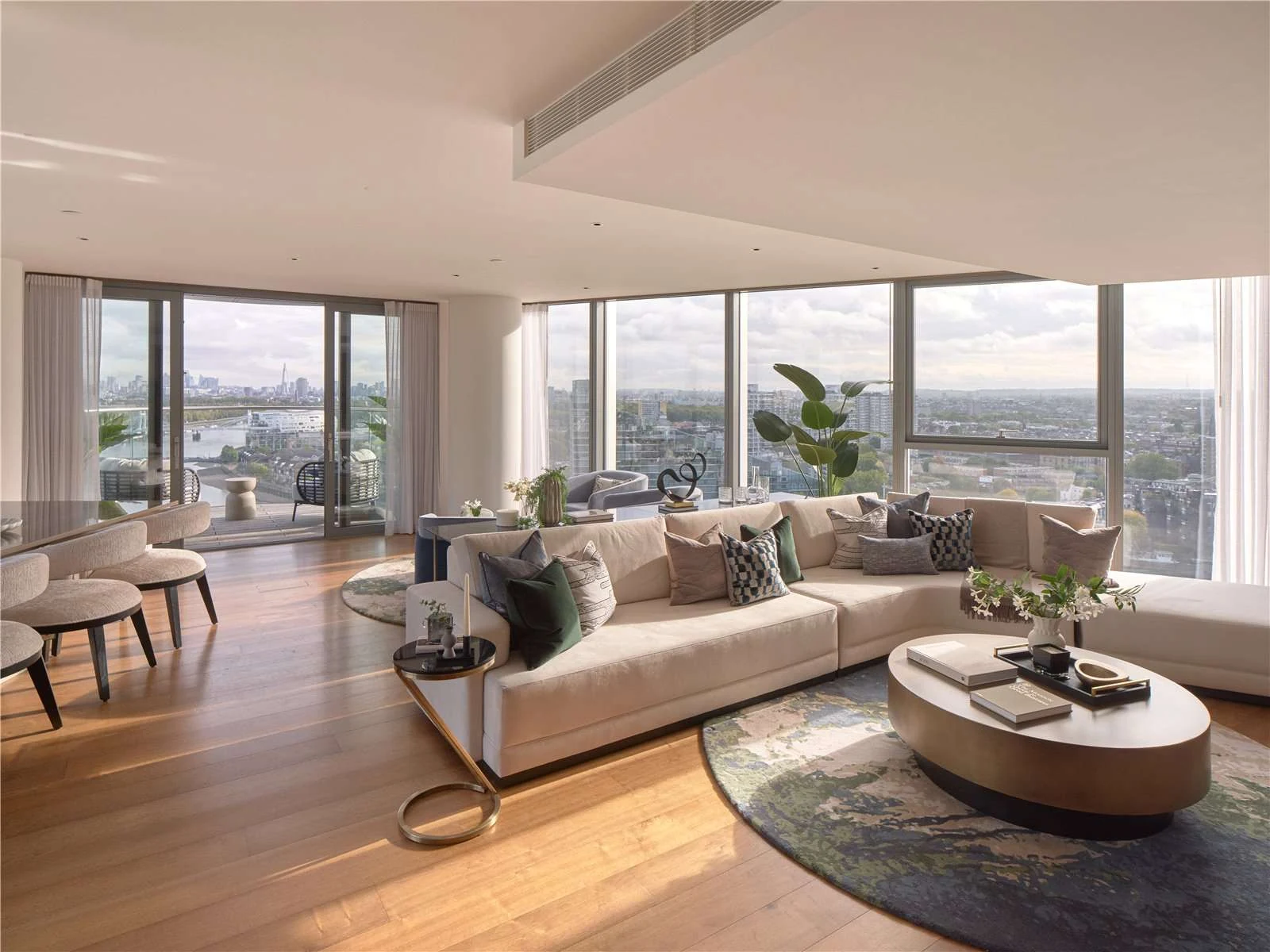 Chelsea Waterfront Sw10 16th Floor Reception Room Curved Cream Sofa Oval Coffee Table Wrap Around Thames Views