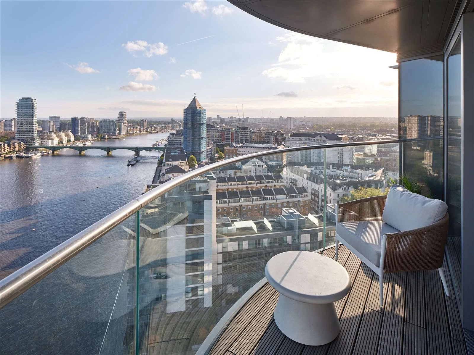 Chelsea Waterfront Sw10 Private Balcony Curved Glass Balustrade White Armchair Battersea Bridge Creek Sunset