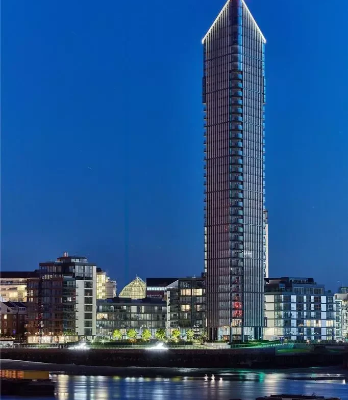 Chelsea Waterfront Tower West Sw10 Night Illuminated Glass Spire Red Beacon Blue Hour Thames Reflection