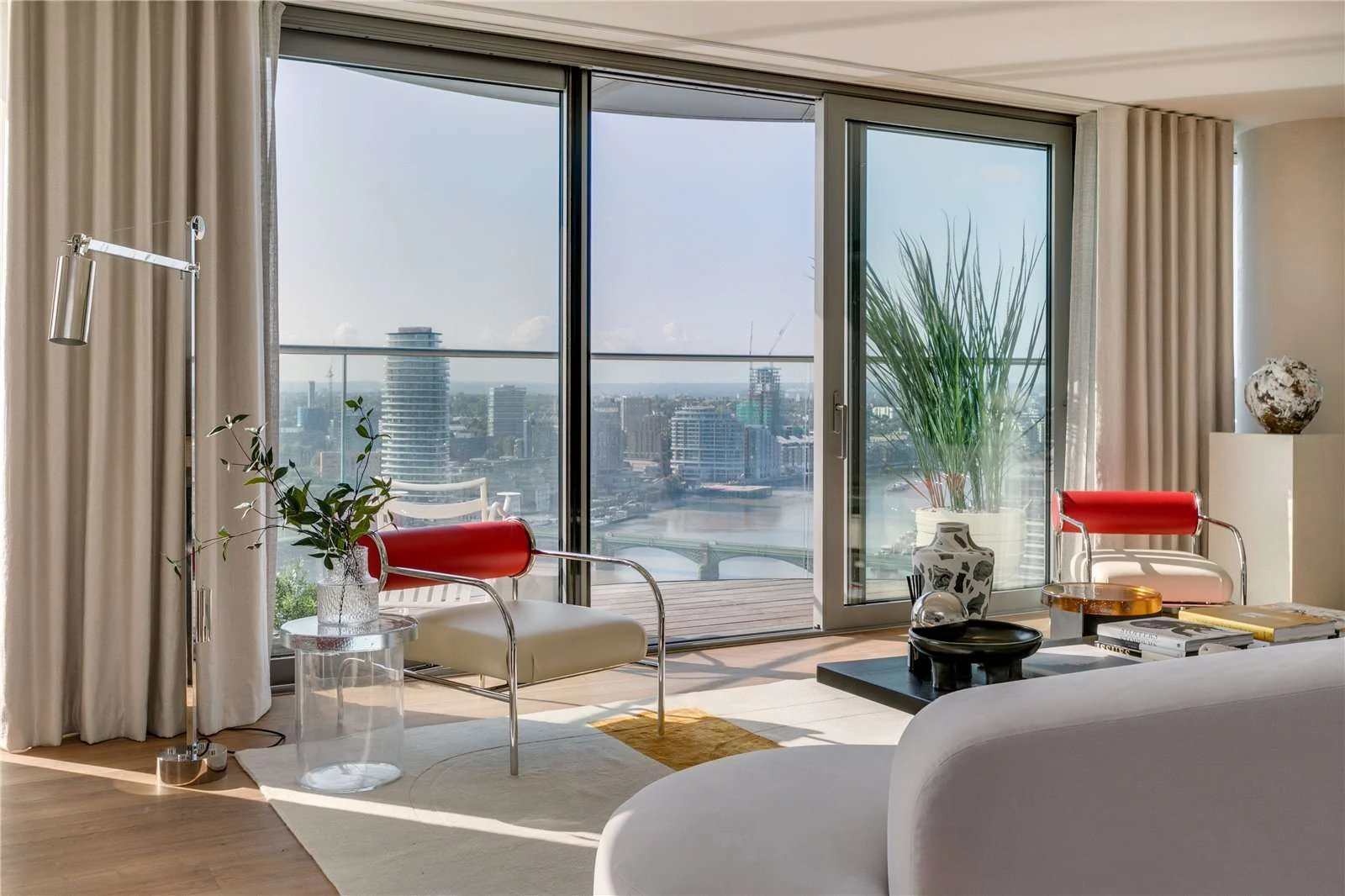 Chelsea Waterfront Tower West Sw10 Reception Room Red Chrome Armchairs Floor To Ceiling Windows Thames Views