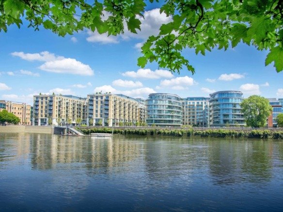 Fulham Reach London riverside apartments with Thames river views, modern buildings and landscaped surroundings