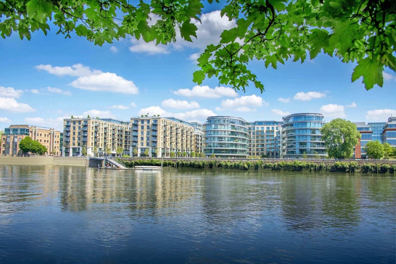 Fulham Reach London riverside apartments with Thames river views, modern buildings and landscaped surroundings