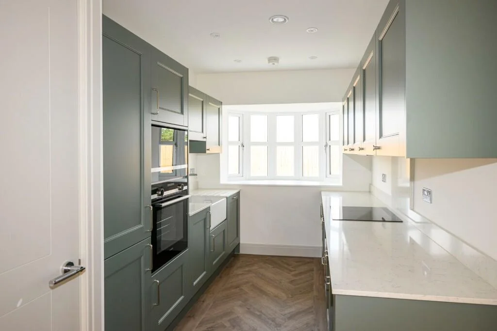 Hartland Village Fleet Kitchen Modern Green Cabinets