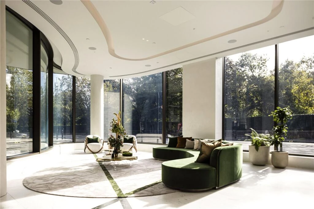 Park Modern Lobby Curved Glass Walls Green Sofa Bayswater Road London