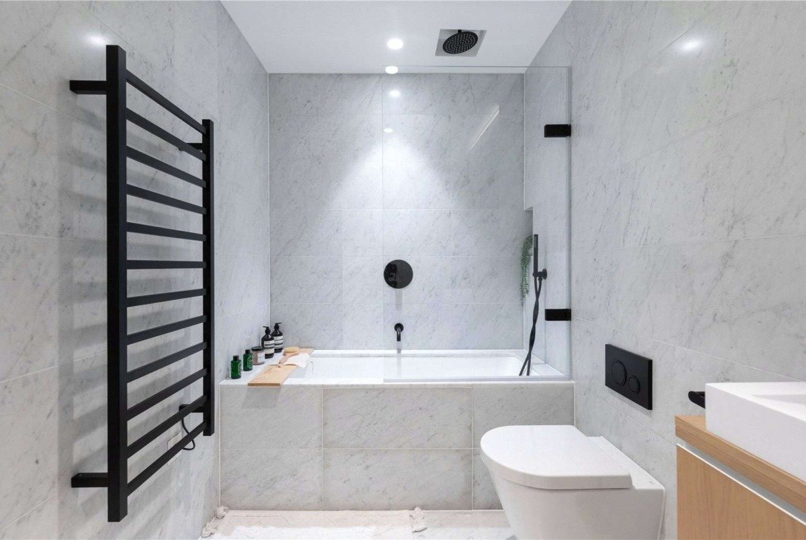 Parkhaus London E5 Hackney Bathroom Marble Tiles Black Heated Towel Rail Bath