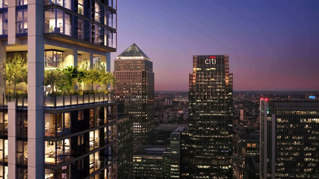 South Quay Plaza Canary Wharf luxury apartments with skyline view at sunset and modern high rise buildings in London