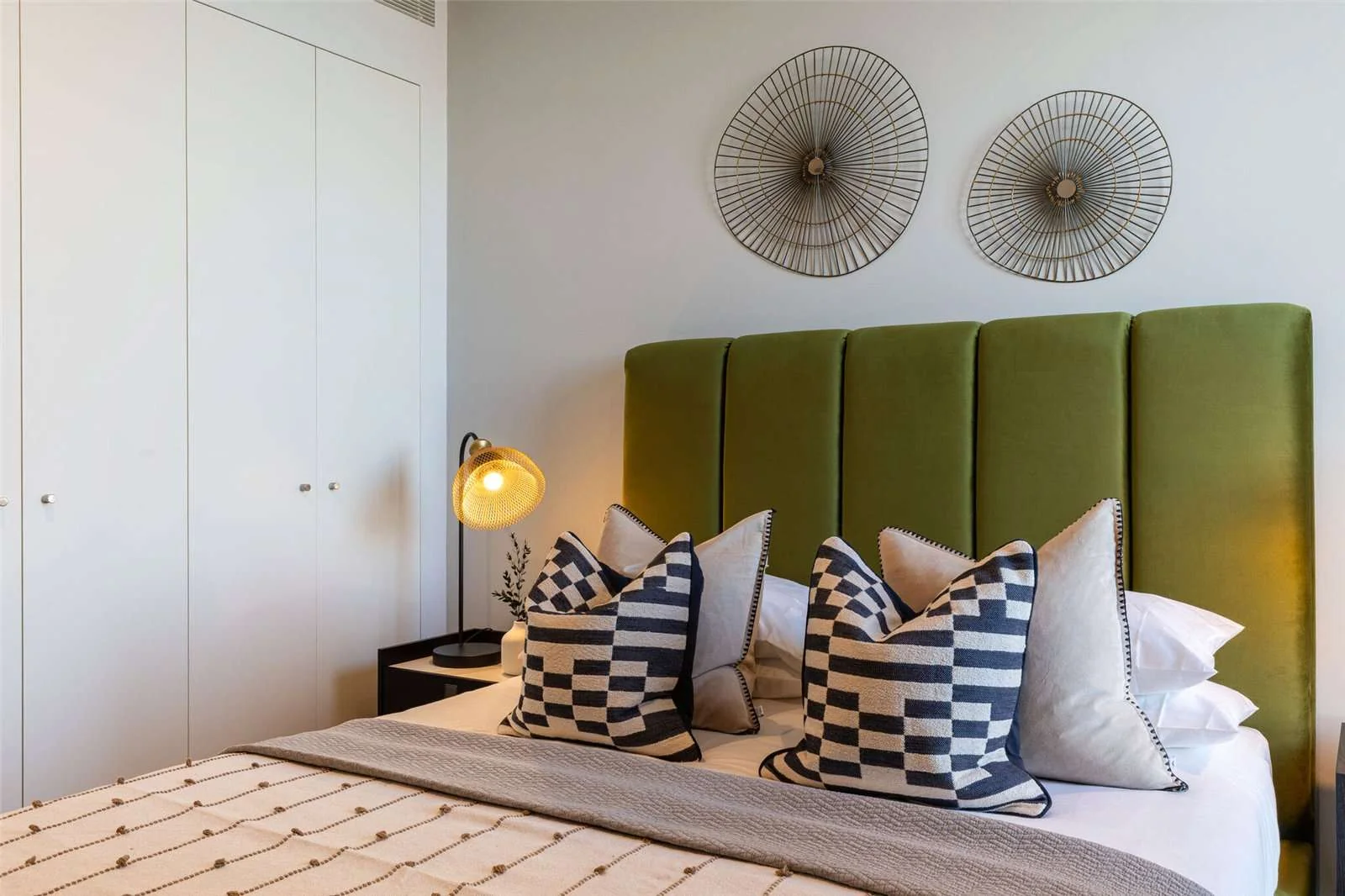 9 Eastfields Riverside Quarter Wandsworth Sw18 Bedroom Green Velvet Headboard Checkered Cushions Close Up London