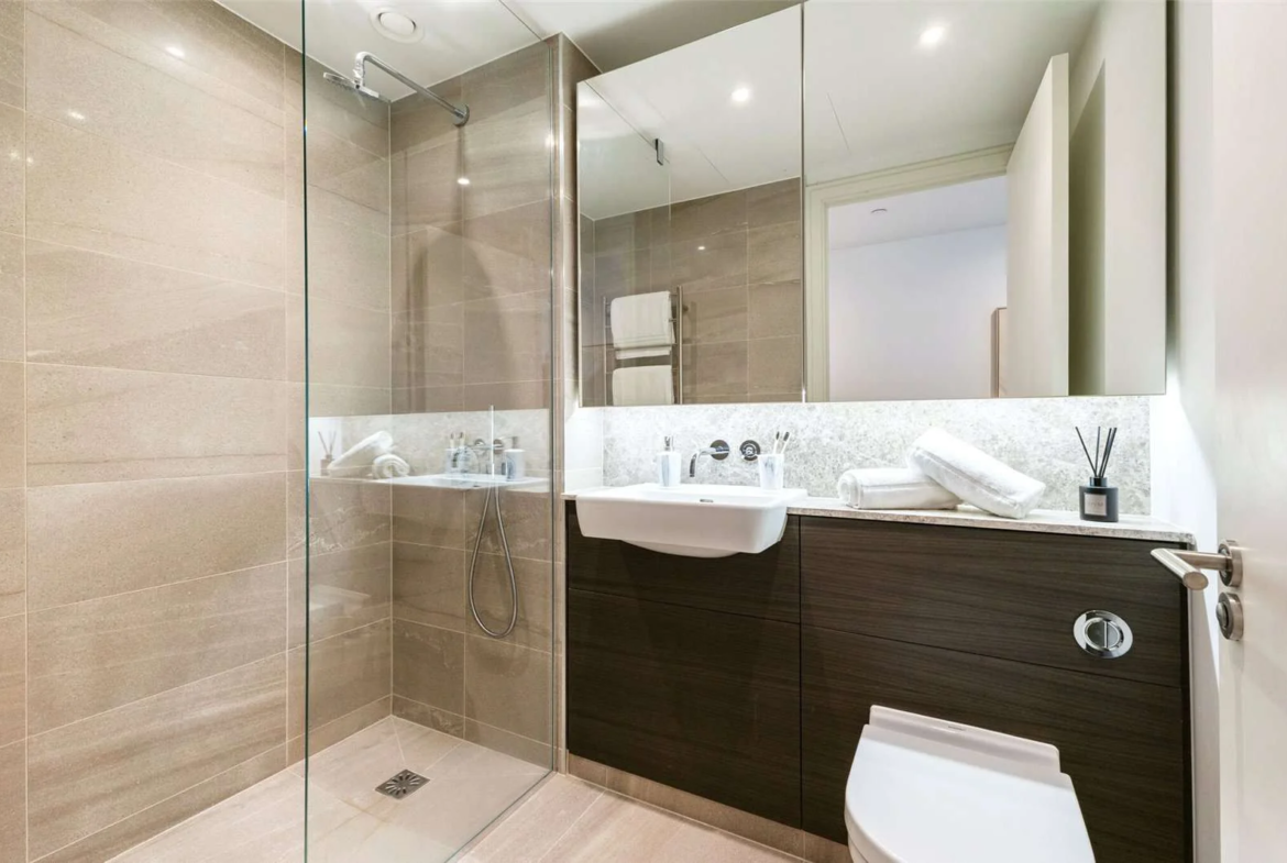 9 Eastfields Riverside Quarter Wandsworth Sw18 Ensuite Shower Room Stone Tiles Dark Vanity Unit London