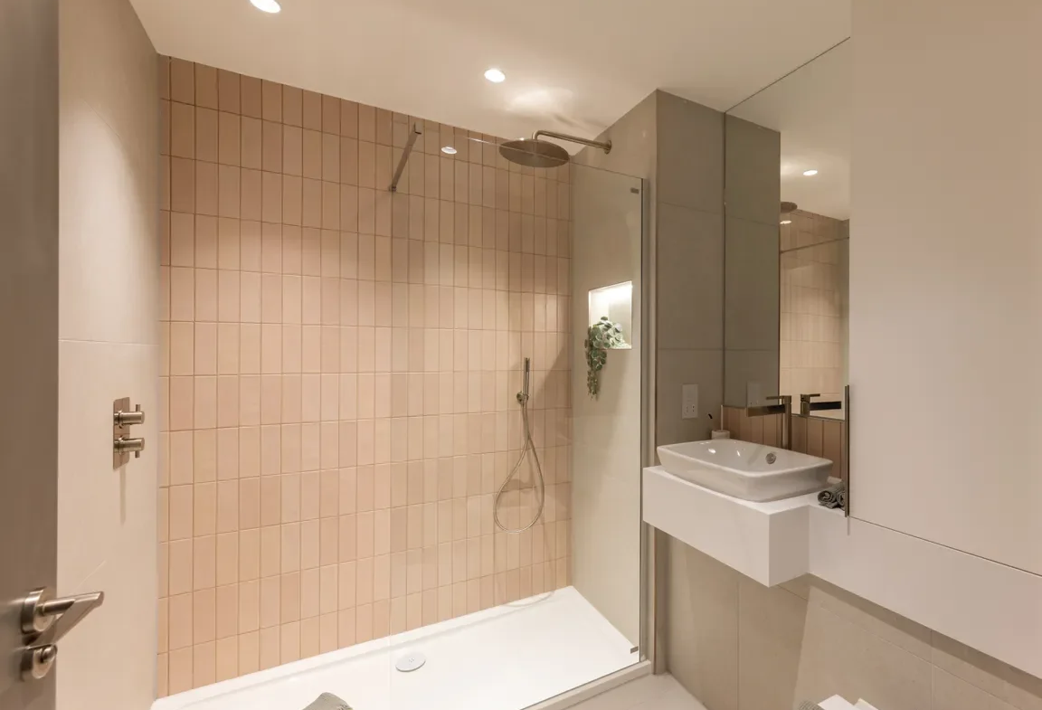 Artisi Hammersmith Town Hall London W6 2 Bed Apartment Ensuite Bathroom Blush Zellige Tiles Rainfall Shower Floating Basin