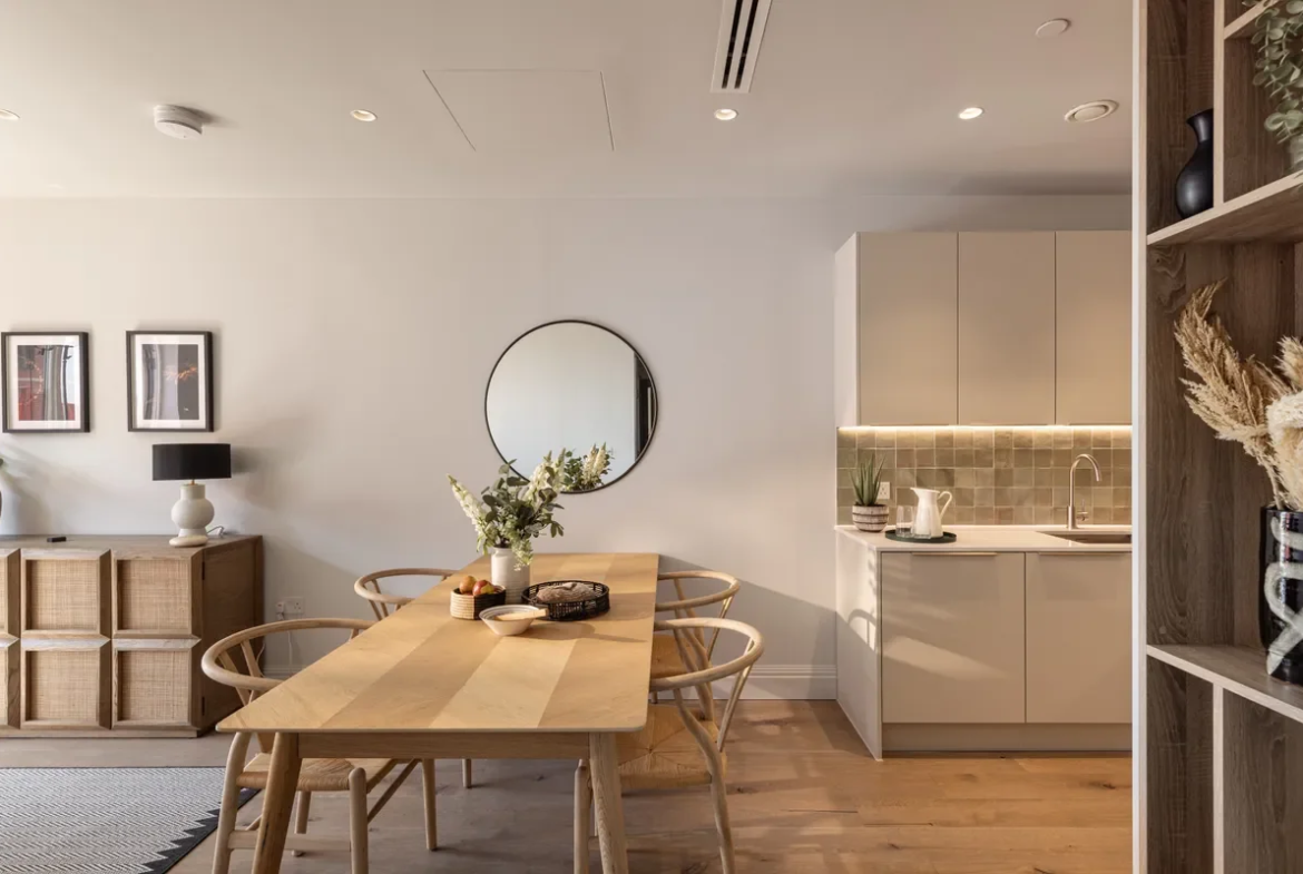 Artisi Hammersmith Town Hall London W6 2 Bed Apartment Kitchen Dining Round Mirror Wishbone Chairs Zellige Splashback