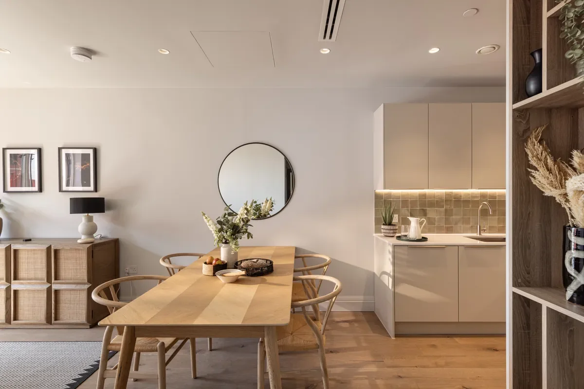 Artisi Hammersmith Town Hall London W6 2 Bed Apartment Kitchen Dining Round Mirror Wishbone Chairs Zellige Splashback