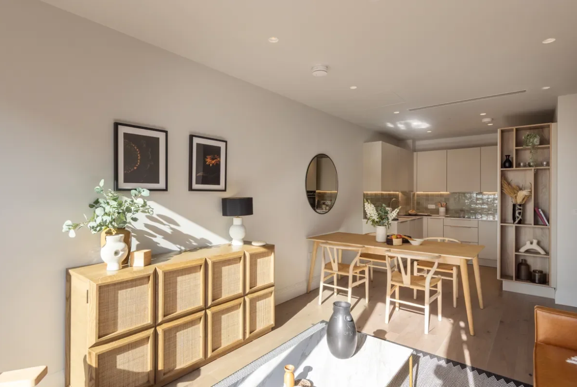 Artisi Hammersmith Town Hall London W6 2 Bed Show Home Open Plan Living Dining Rattan Sideboard Oak Wishbone Chairs Kitchen