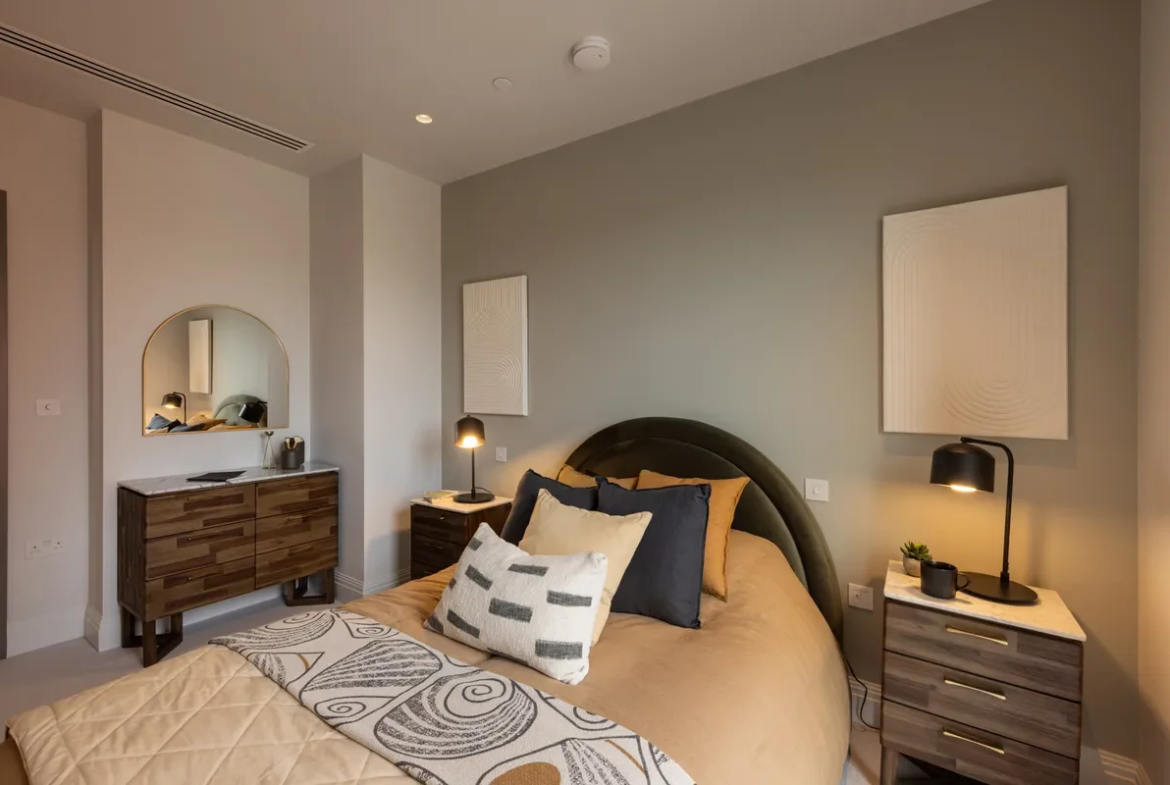 Artisi Hammersmith Town Hall London W6 5th Floor Master Bedroom Sage Green Feature Wall Olive Velvet Headboard Walnut Drawers