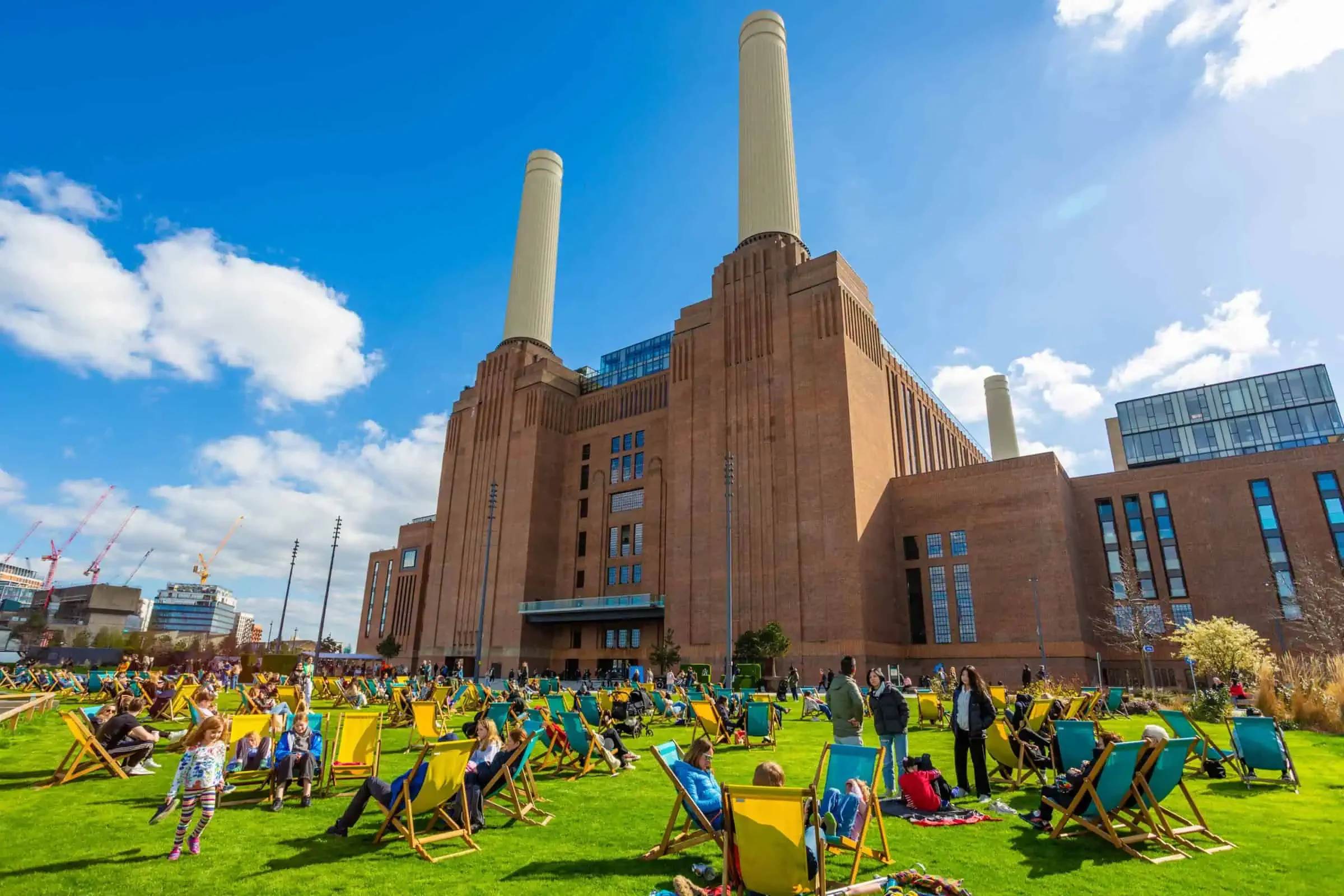 Battersea Power Station Sw11 Exterior Deckchairs Four Chimneys Sunny Day