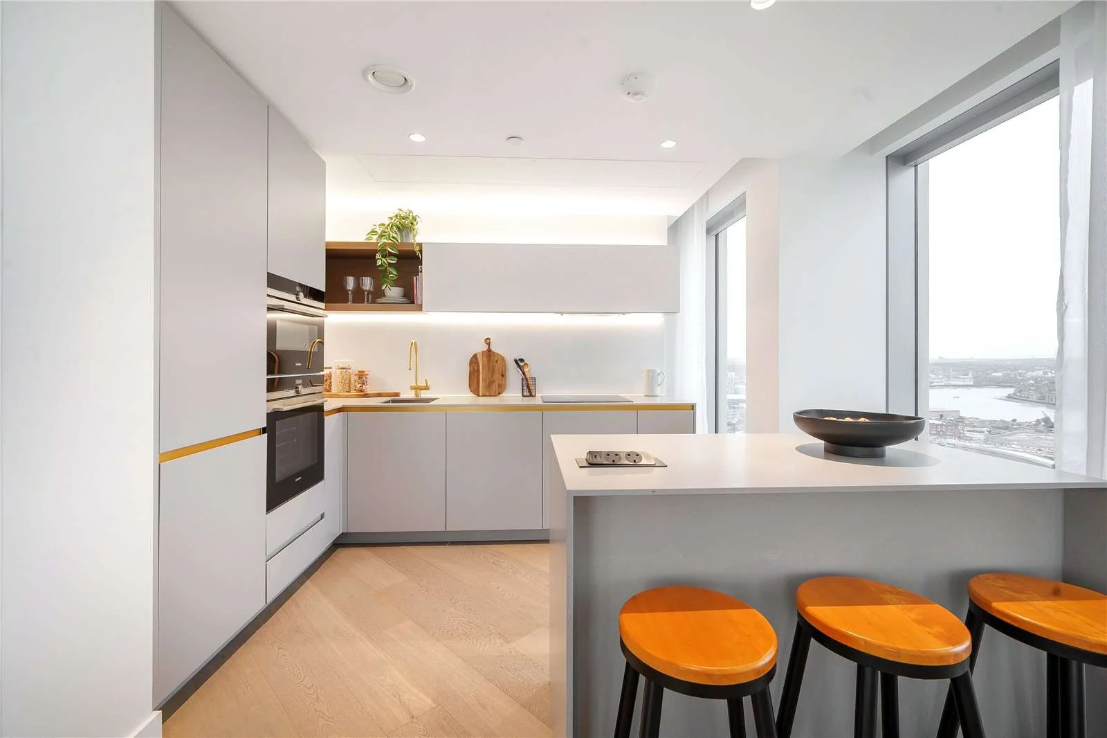 Peninsula Riverfront Greenwich London Se10 Kitchen Island Breakfast Bar Gold Tap Thames View