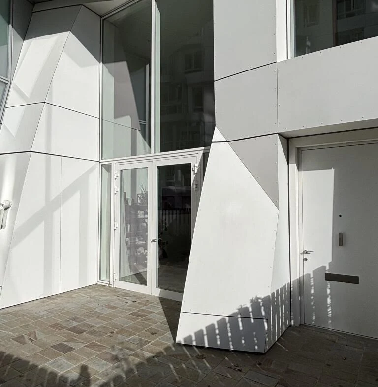 Prospect Place Battersea Power Station Sw11 8dl London Frank Gehry Angular White Facade Entrance Door