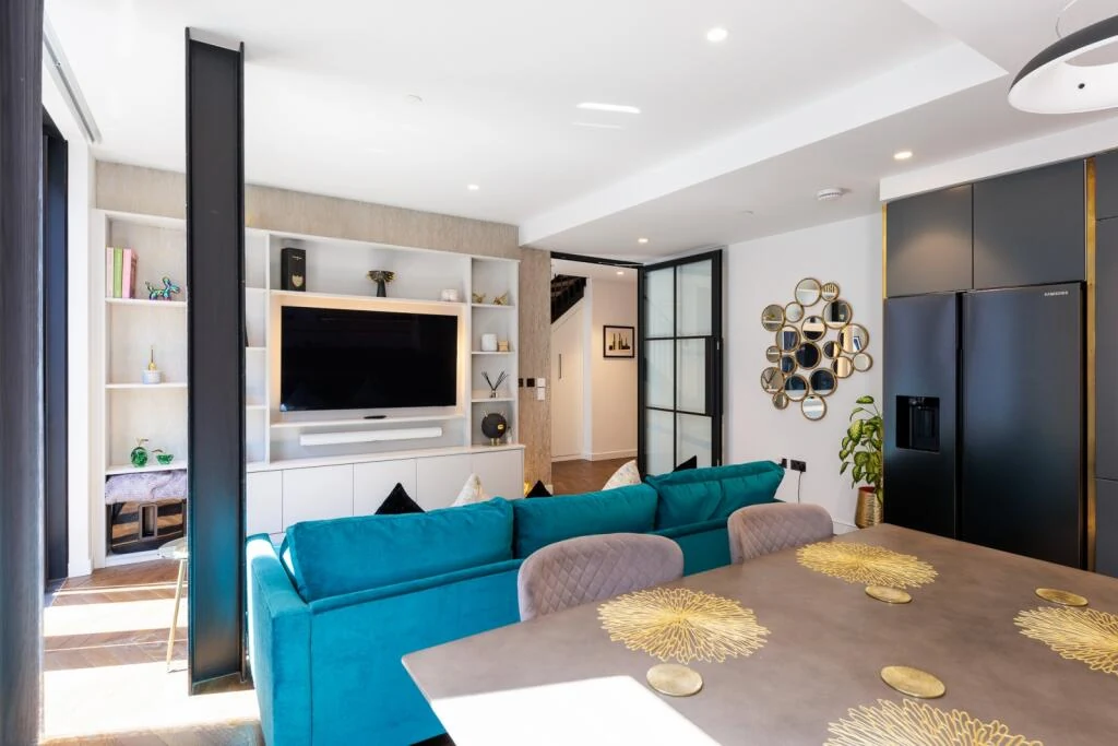 Switch House West Battersea Power Station Sw11 Duplex Open Plan Living Room Teal Sofa Bespoke Shelving London