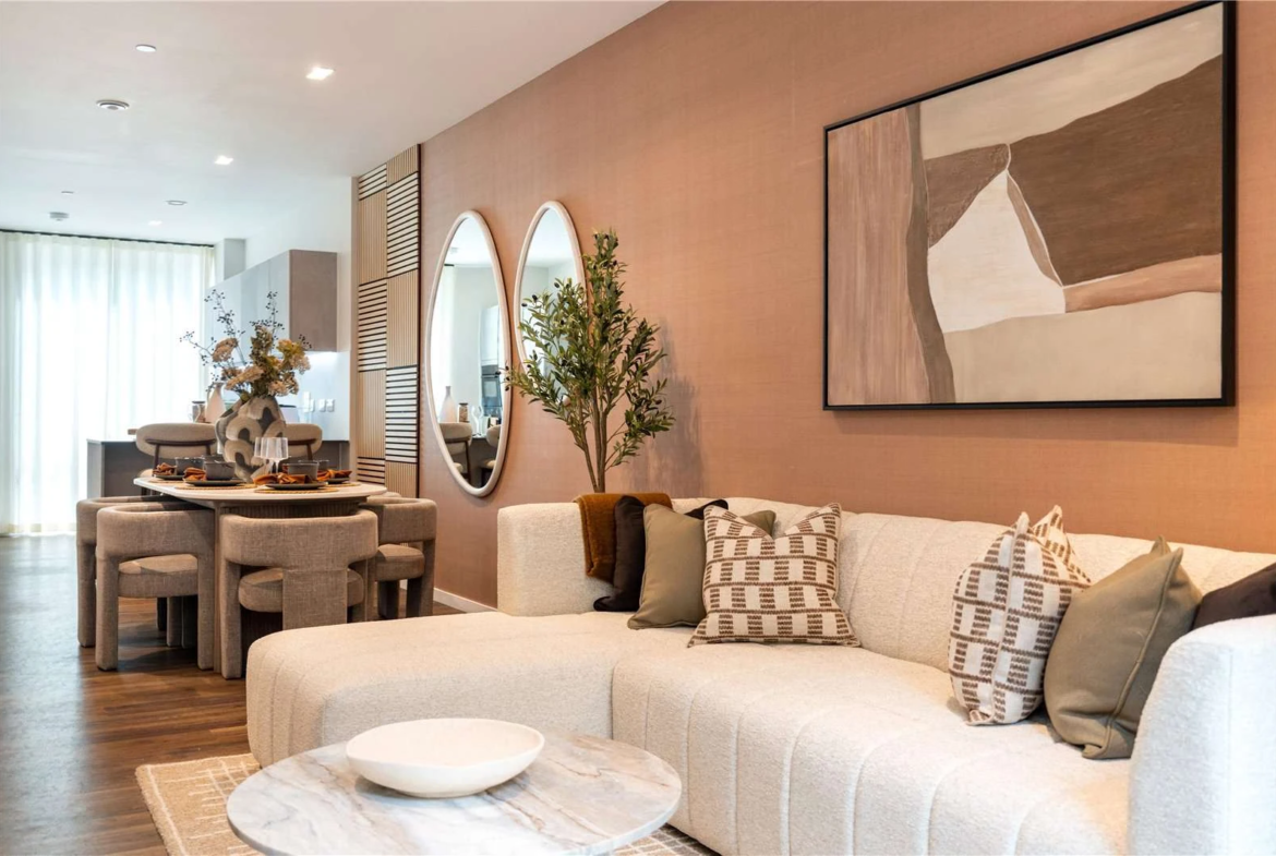 The Auria 13 Wheatstone Gardens W10 Lounge Cream Sofa Oval Mirrors Terracotta Feature Wall