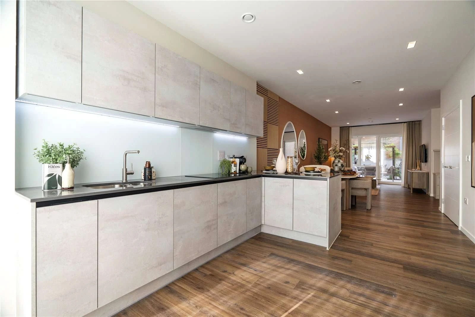 The Auria 13 Wheatstone Gardens W10 Open Plan Kitchen Living Concrete Effect Cabinets Dark Worktop