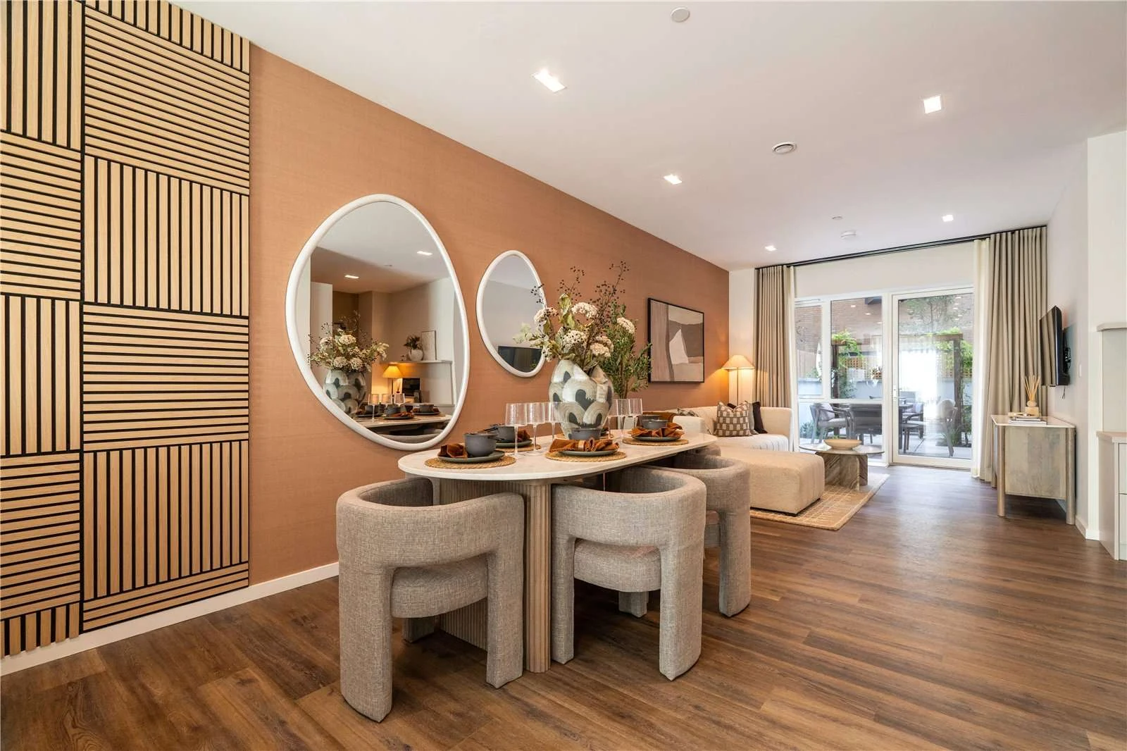 The Auria Portobello Square W10 Dining Room Oval Table Barrel Chairs Acoustic Wall Panel Mews