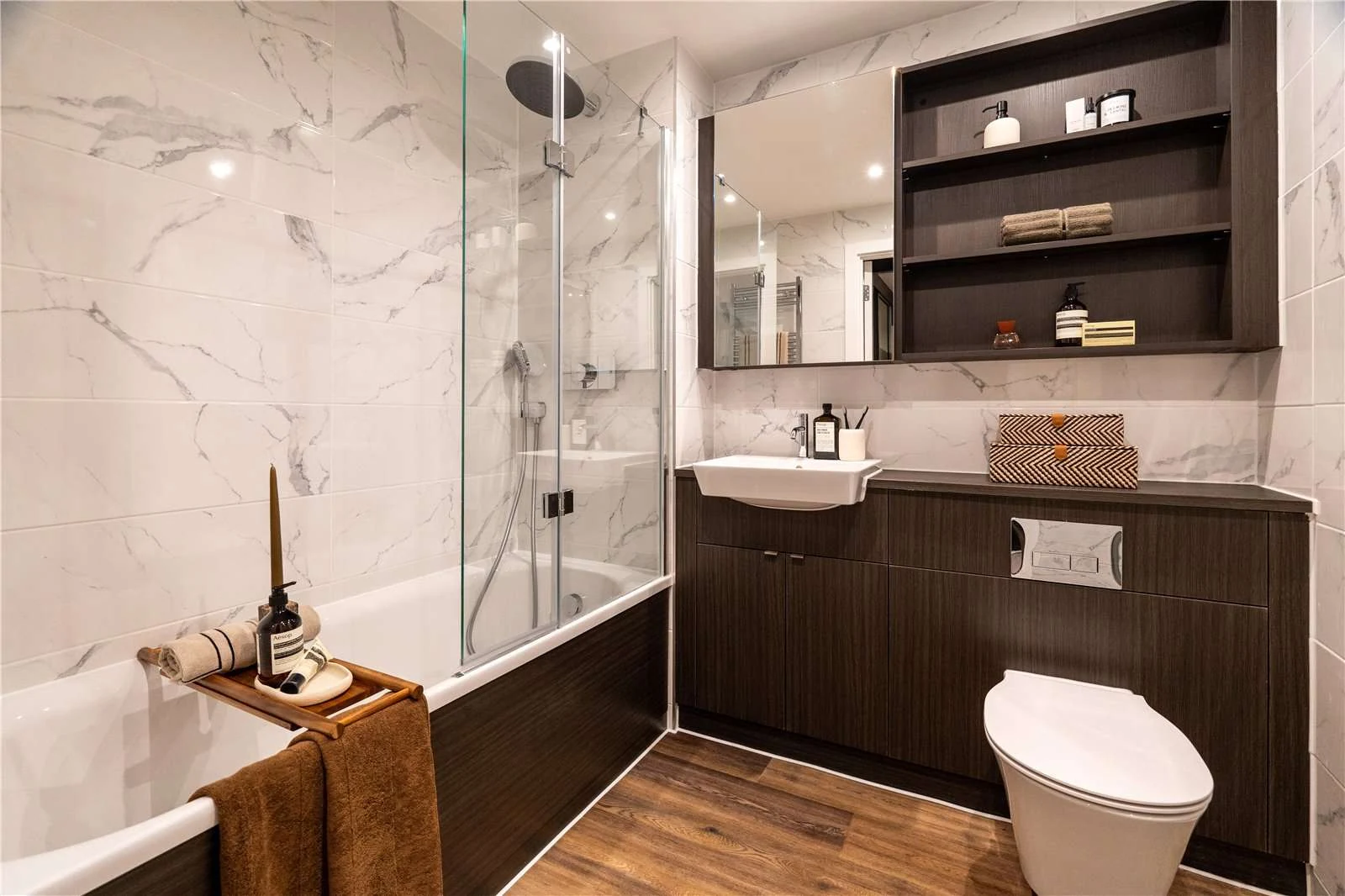 The Auria Portobello Square W10 Family Bathroom Marble Tiles Bath Overhead Shower Dark Vanity