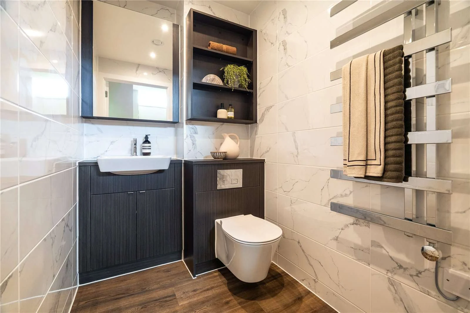 The Auria Portobello Square W10 Guest Bathroom Marble Tiles Dark Vanity Heated Towel Rail