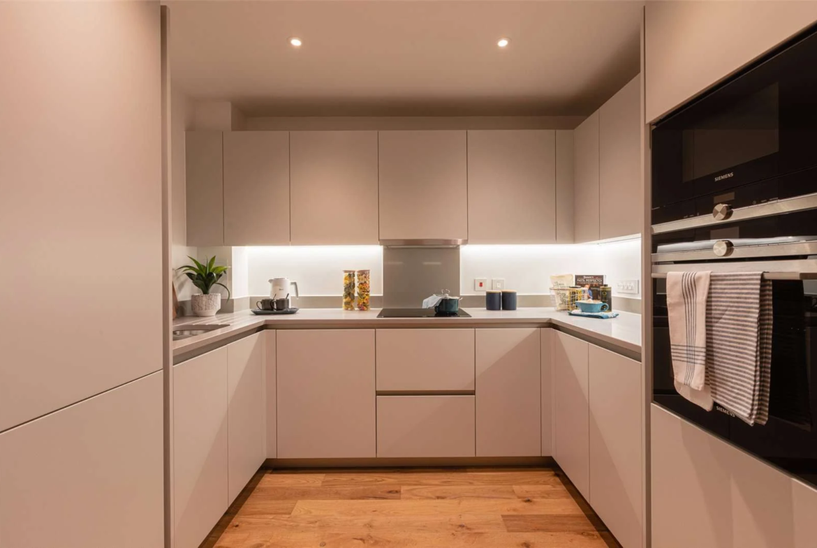 The Auria Portobello Square W10 Handleless Kitchen U Shape Siemens Appliances Oak Floor Duplex