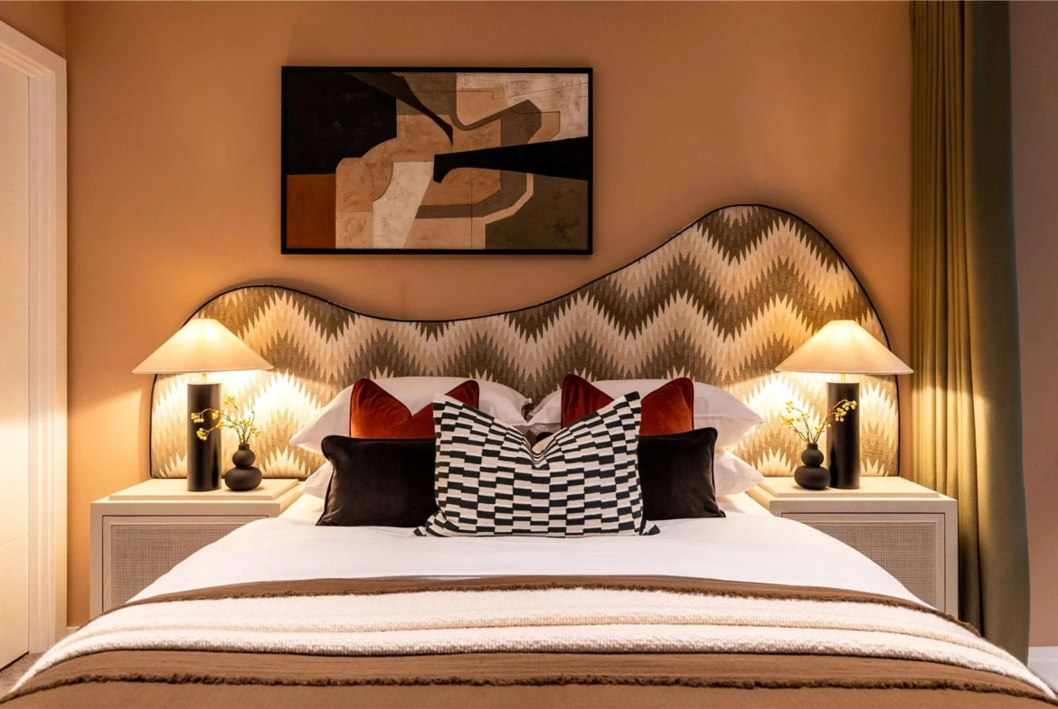 The Auria Portobello Square W10 Master Bedroom Closeup Wavy Headboard Velvet Cushions