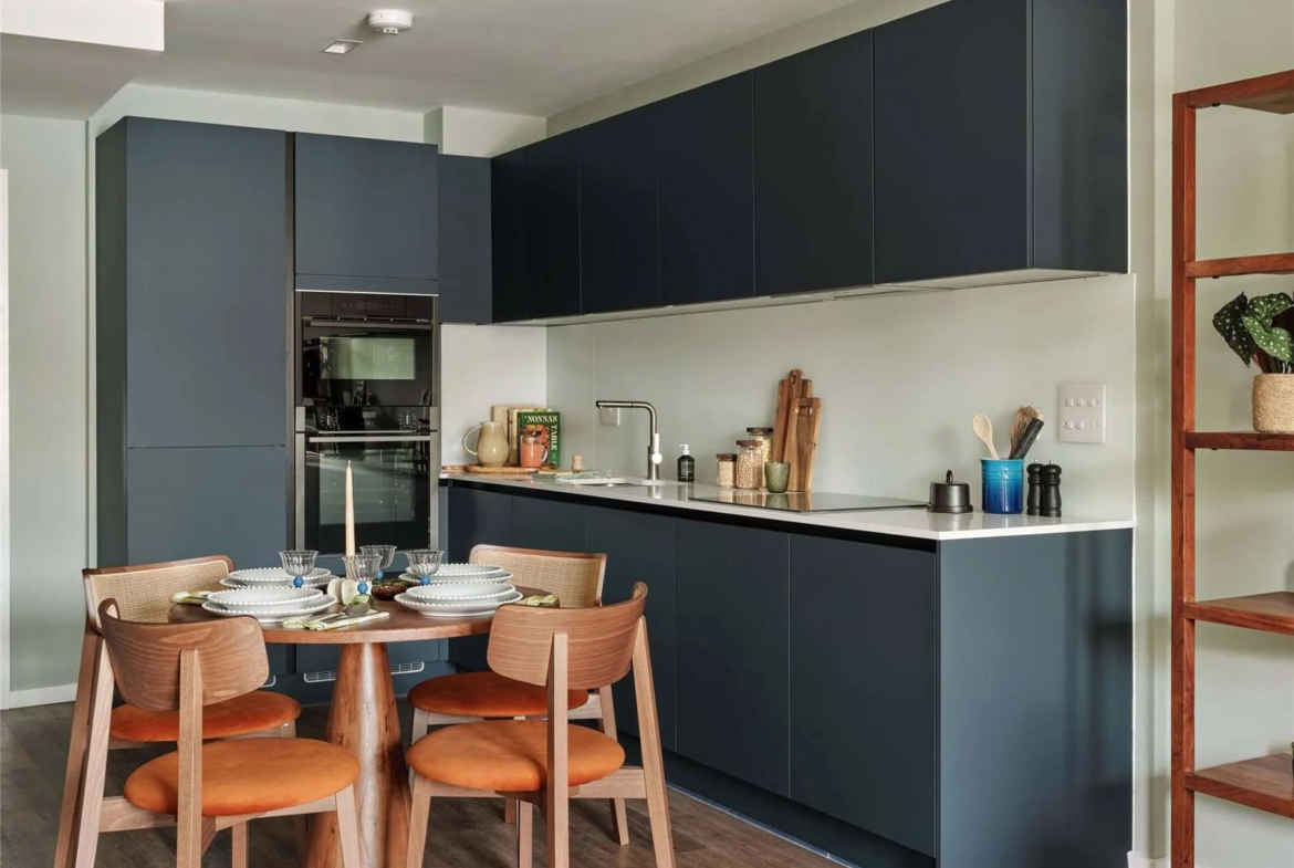 The Auria Portobello Square W10 Navy Handleless Kitchen Dining Table Integrated Appliances