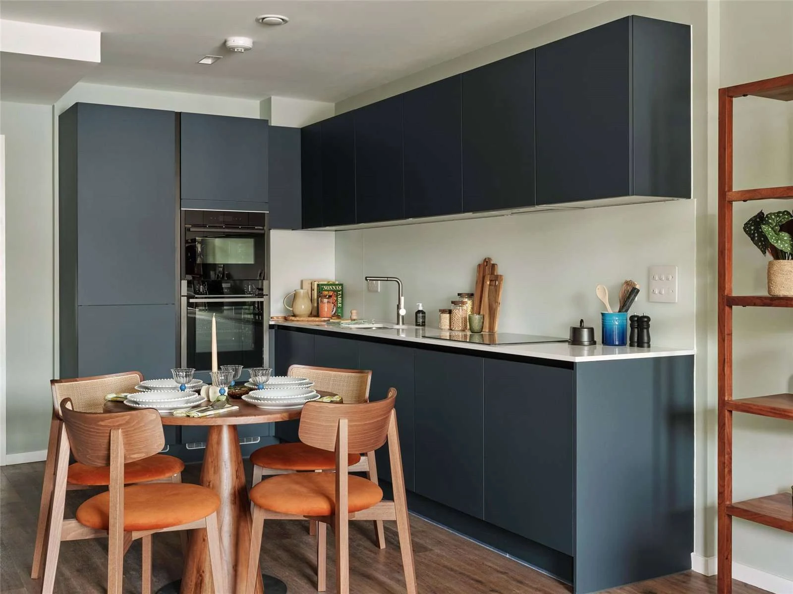The Auria Portobello Square W10 Navy Handleless Kitchen Dining Table Integrated Appliances
