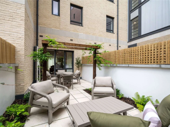 The Auria Portobello Square W10 Rear Garden Terrace Pergola Lounge Seating Cream Brick Mews