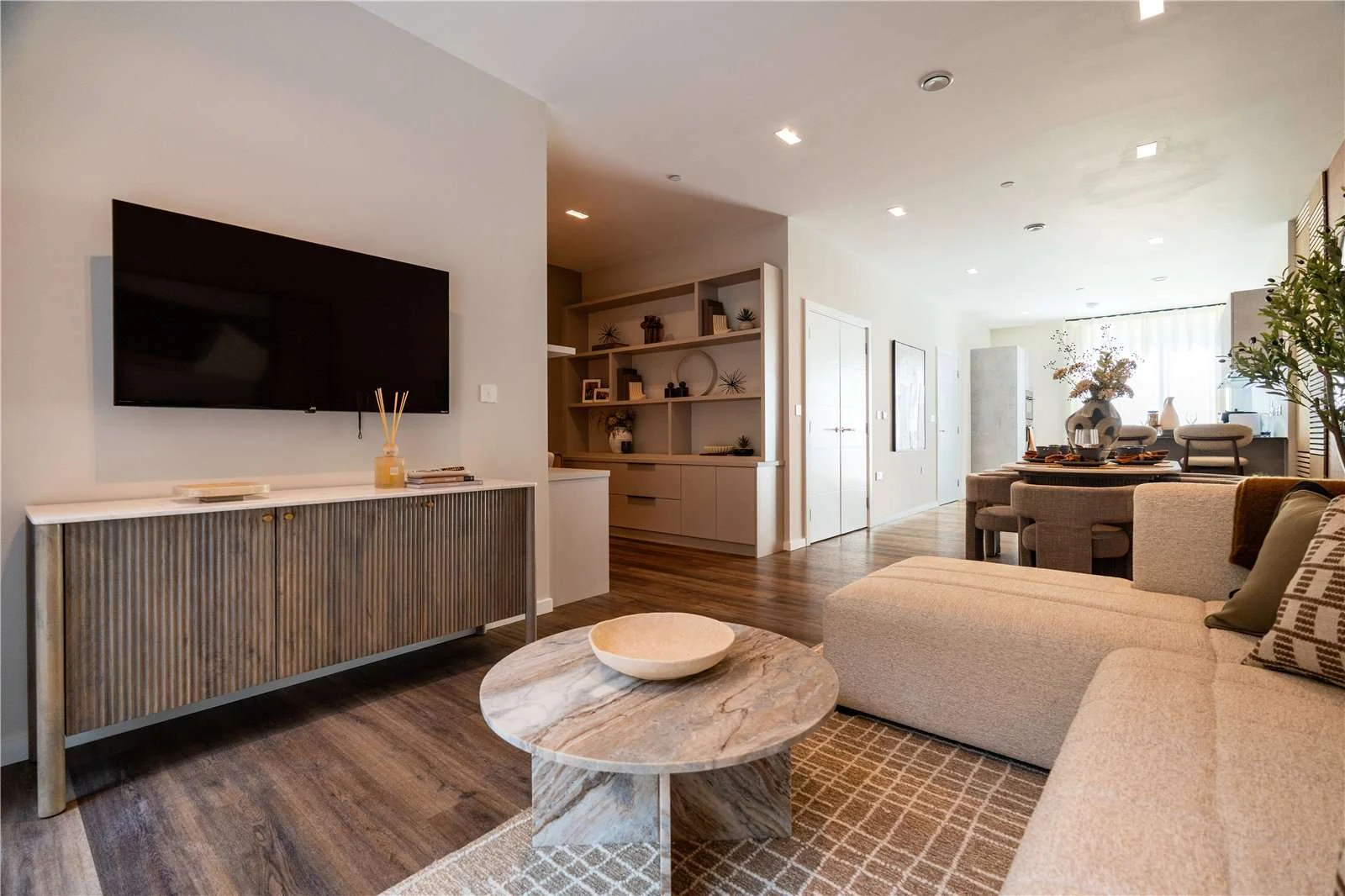 The Auria Portobello Square W10 Reception Room Built In Shelving Marble Coffee Table Open Plan