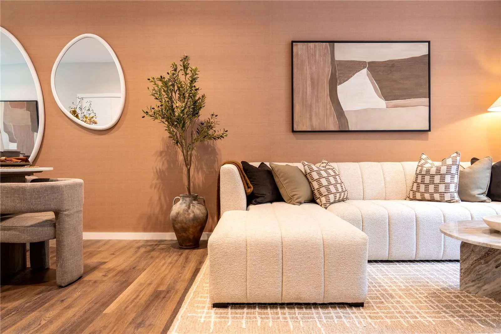 The Auria Portobello Square Ladbroke Grove London W10 Living Room Cream Sectional Sofa Terracotta Feature Wall